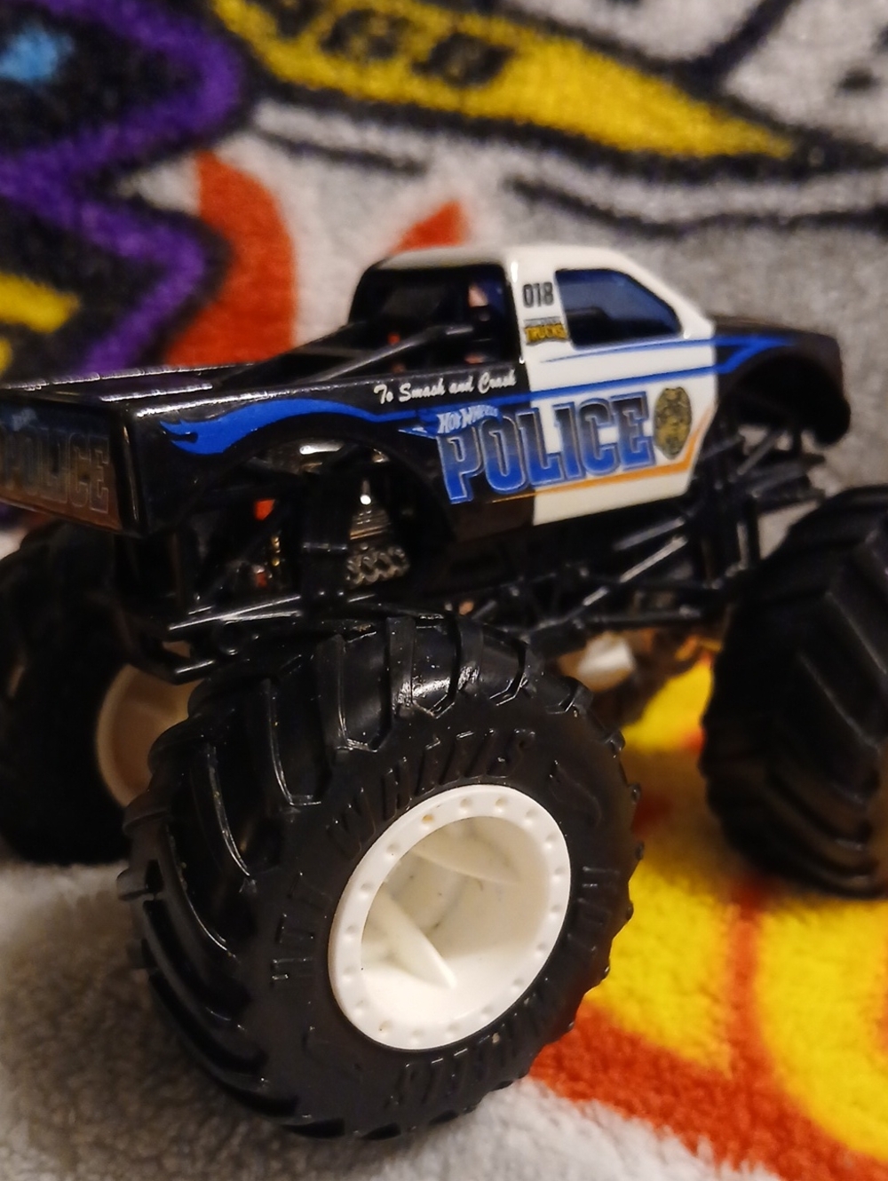 Police Hot Wheels Monster Truck Toy — Black, White & Blue